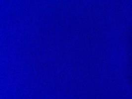 Dark blue velvet fabric texture used as background. Empty dark blue fabric background of soft and smooth textile material. There is space for text. photo