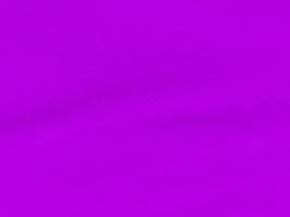 Violet clean wool texture background. light natural sheep wool. purple seamless cotton. texture of fluffy fur for designers. close-up fragment red wool carpet.. photo