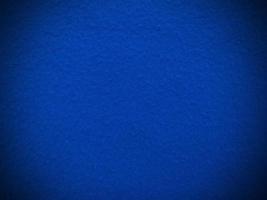 Felt  blue soft rough textile material background texture close up,poker table,tennis ball,table cloth. Empty blue fabric background. photo