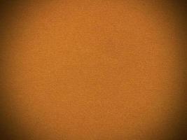 yellow velvet fabric texture used as background. Empty yellow fabric background of soft and smooth textile material. There is space for text.. photo