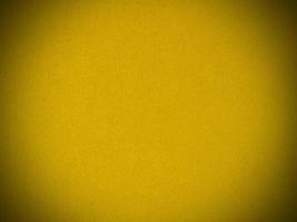 Yellow velvet fabric texture used as background. Empty yellow fabric background of soft and smooth textile material. There is space for text. photo