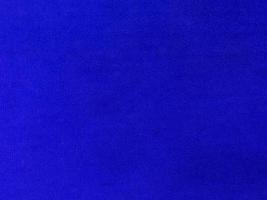 Blue velvet fabric texture used as background. Empty blue fabric background of soft and smooth textile material. There is space for text. photo