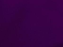 Purple velvet fabric texture used as background. Empty purple fabric background of soft and smooth textile material. There is space for text. photo