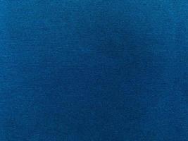 Dark blue velvet fabric texture used as background. Empty dark blue fabric background of soft and smooth textile material. There is space for text. photo