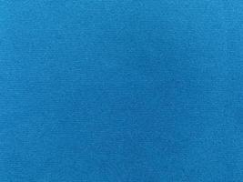 Blue velvet fabric texture used as background. Empty blue fabric background of soft and smooth textile material. There is space for text. photo