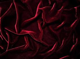 Red velvet fabric texture used as background. Empty red fabric background of soft and smooth textile material. There is space for text. photo