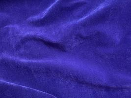 Dark blue velvet fabric texture used as background. Empty dark blue fabric background of soft and smooth textile material. There is space for text. photo