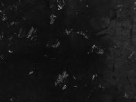 textura transparente de pared de cemento negro una superficie rugosa, con espacio para texto, para un fondo. foto