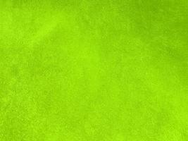 Light green velvet fabric texture used as background. Empty light green fabric background of soft and smooth textile material. There is space for text... photo