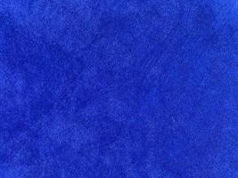 Blue velvet fabric texture used as background. Empty blue fabric background of soft and smooth textile material. There is space for text. photo