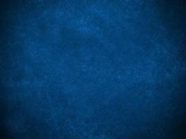 Dark blue velvet fabric texture used as background. Empty dark blue fabric background of soft and smooth textile material. There is space for text. photo