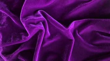 Purple velvet fabric texture used as background. Empty purple fabric background of soft and smooth textile material. There is space for text. photo