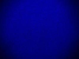 Dark blue velvet fabric texture used as background. Empty dark blue fabric background of soft and smooth textile material. There is space for text. photo