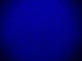 Dark blue velvet fabric texture used as background. Empty dark blue fabric background of soft and smooth textile material. There is space for text. photo