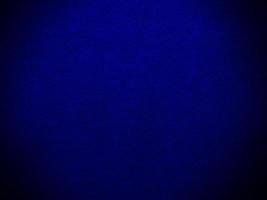 Dark blue velvet fabric texture used as background. Empty dark blue fabric background of soft and smooth textile material. There is space for text. photo