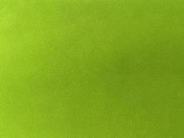 Light green velvet fabric texture used as background. Empty light green fabric background of soft and smooth textile material. There is space for text. photo