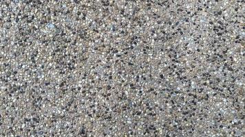Irregular polished marble background It comes in a mix of white and black stones, perfect for a vintage wallpaper. And designed graphic design There is more space to create additional decorations. photo