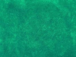Dark green old velvet fabric texture used as background. Empty green fabric background of soft and smooth textile material. There is space for text.. photo