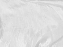 The texture of the old white fabric has a vintage dullness, there is a text area for the background, used for vintage wallpapers and designs. photo