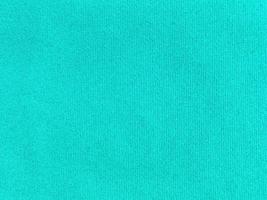 Light blue velvet fabric texture used as background. Empty light blue fabric background of soft and smooth textile material. There is space for text.. photo