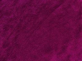 Purple magenta velvet fabric texture used as background. Empty purple fabric background of soft and smooth textile material. There is space for text.. photo