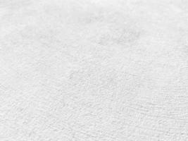 Seamless texture of white cement wall a rough surface, with space for text, for a background.. photo