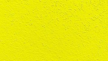 Seamless texture of yellow cement wall a rough surface, with space for text, for a background. photo