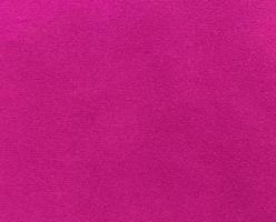 Pink velvet fabric texture used as background. Empty pink fabric background of soft and smooth textile material. There is space for text. photo