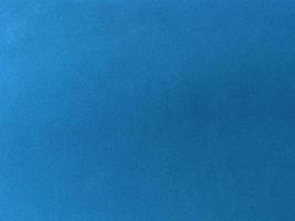 Dark blue velvet fabric texture used as background. Empty dark blue fabric background of soft and smooth textile material. There is space for text. photo