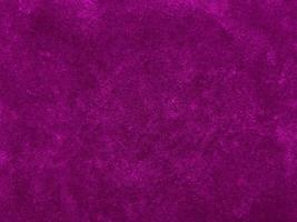 Purple velvet fabric texture used as background. Empty purple fabric background of soft and smooth textile material. There is space for text. photo
