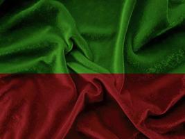 green and red  velvet fabric texture used as background. Empty Dark green and red fabric background of soft and smooth textile material. There is space for text.christmas concept. photo