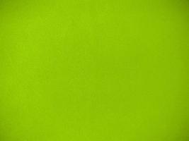 Light green velvet fabric texture used as background. Empty light green fabric background of soft and smooth textile material. There is space for text. photo