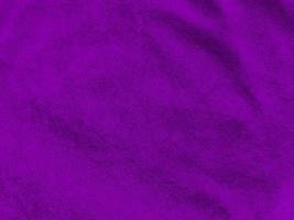 Purple velvet fabric texture used as background. Empty purple fabric background of soft and smooth textile material. There is space for text. photo