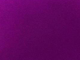 Purple velvet fabric texture used as background. Empty purple fabric background of soft and smooth textile material. There is space for text.. photo