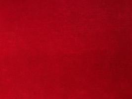 Red old velvet fabric texture used as background. Empty red fabric background of soft and smooth textile material. There is space for text. photo