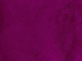 Purple magenta velvet fabric texture used as background. Empty purple fabric background of soft and smooth textile material. There is space for text. photo