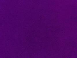 Purple velvet fabric texture used as background. Empty purple fabric background of soft and smooth textile material. There is space for text. photo