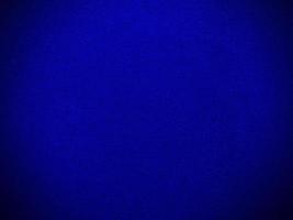 Dark blue velvet fabric texture used as background. Empty dark blue fabric background of soft and smooth textile material. There is space for text. photo