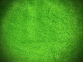 Green old velvet fabric texture used as background. Empty green fabric background of soft and smooth textile material. There is space for text. photo