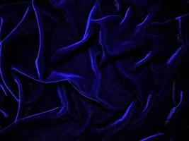 Blue velvet fabric texture used as background. Empty blue fabric background of soft and smooth textile material. There is space for text. photo