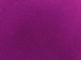 Purple velvet fabric texture used as background. Empty purple fabric background of soft and smooth textile material. There is space for text. photo