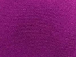 Purple velvet fabric texture used as background. Empty purple fabric background of soft and smooth textile material. There is space for text. photo