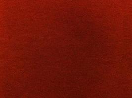 Dark red velvet fabric texture used as background. Empty red fabric background of soft and smooth textile material. There is space for text.. photo