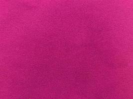 Pink velvet fabric texture used as background. Empty pink fabric background of soft and smooth textile material. There is space for text. photo