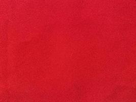 Red velvet fabric texture used as background. Empty red fabric background of soft and smooth textile material. There is space for text. photo