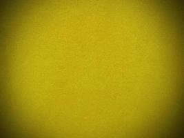 Yellow velvet fabric texture used as background. Empty yellow fabric background of soft and smooth textile material. There is space for text... photo