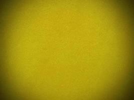 Yellow velvet fabric texture used as background. Empty yellow fabric background of soft and smooth textile material. There is space for text... photo