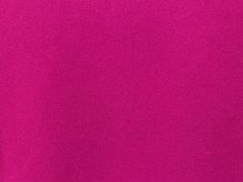 Pink velvet fabric texture used as background. Empty pink fabric background of soft and smooth textile material. There is space for text. photo