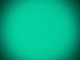 Mint green velvet fabric texture used as background. Empty green fabric background of soft and smooth textile material. There is space for text. photo