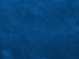 Dark blue velvet fabric texture used as background. Empty dark blue fabric background of soft and smooth textile material. There is space for text. photo